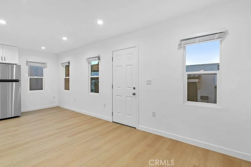 10112 Fernglen Avenue Tujunga, CA 91042 - Photo 9 of 12 a view of an empty room with a window