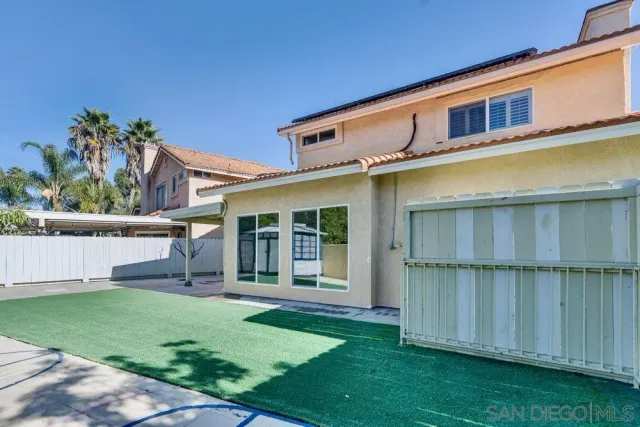 a view of backyard with green space