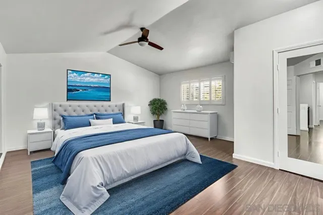 a bedroom with bed and window