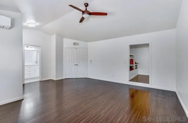 a bathroom with a sink a mirror and a bathtub