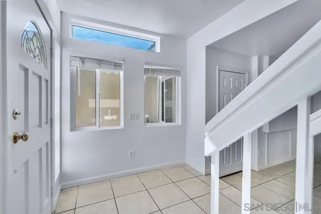 a view of a livingroom with a staircase