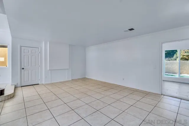 a bathroom with a granite countertop bathtub shower sink and mirror