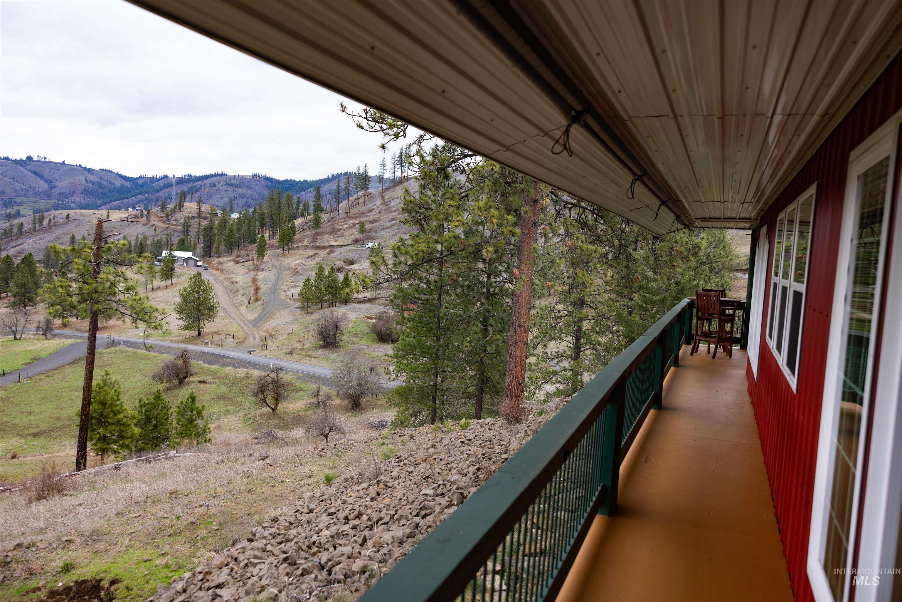 402 Beaverslide Road Kamiah, ID 83536 - Photo 5 of 46 Deck featuring a mountain view