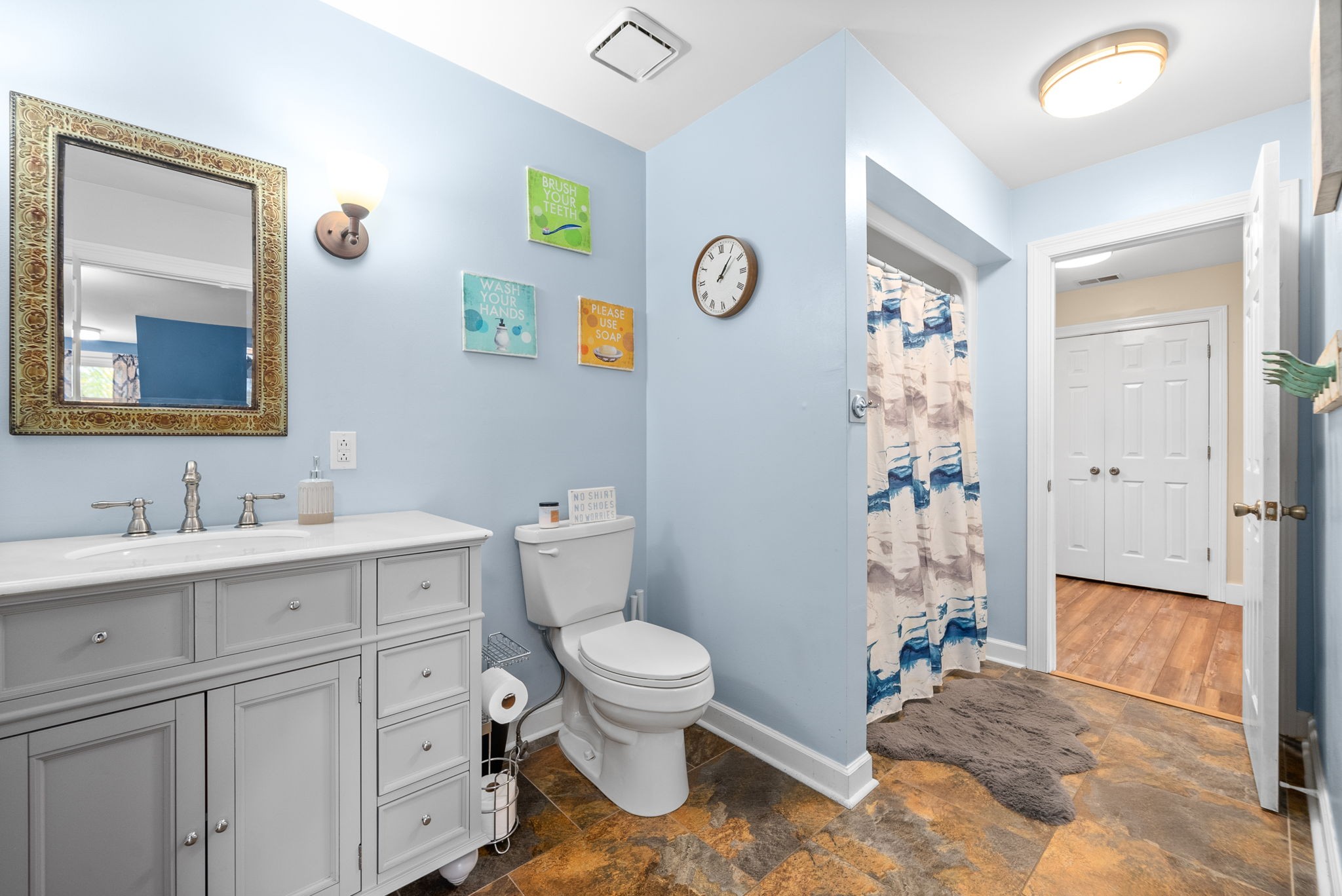 4813 Henry Gower Road Pleasant View, TN 37146 - Photo 23 of 49 a bathroom with a sink a toilet and shower