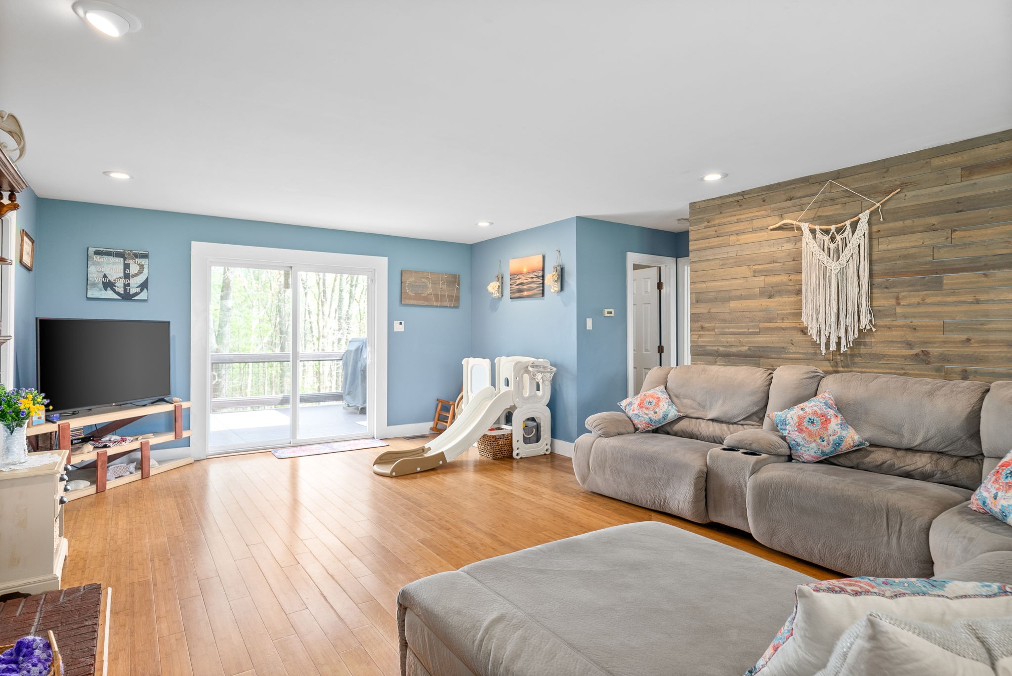 4813 Henry Gower Road Pleasant View, TN 37146 - Photo 5 of 49 a living room with furniture and a flat screen tv