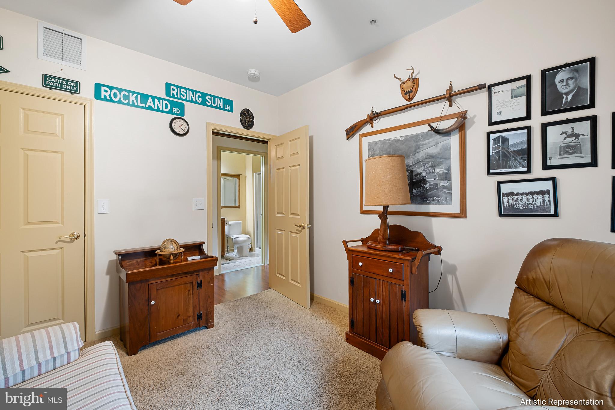 1515 Rockland Road, Unit 301 Wilmington, DE 19803 - Photo 20 of 49 a living room with furniture and wooden floor