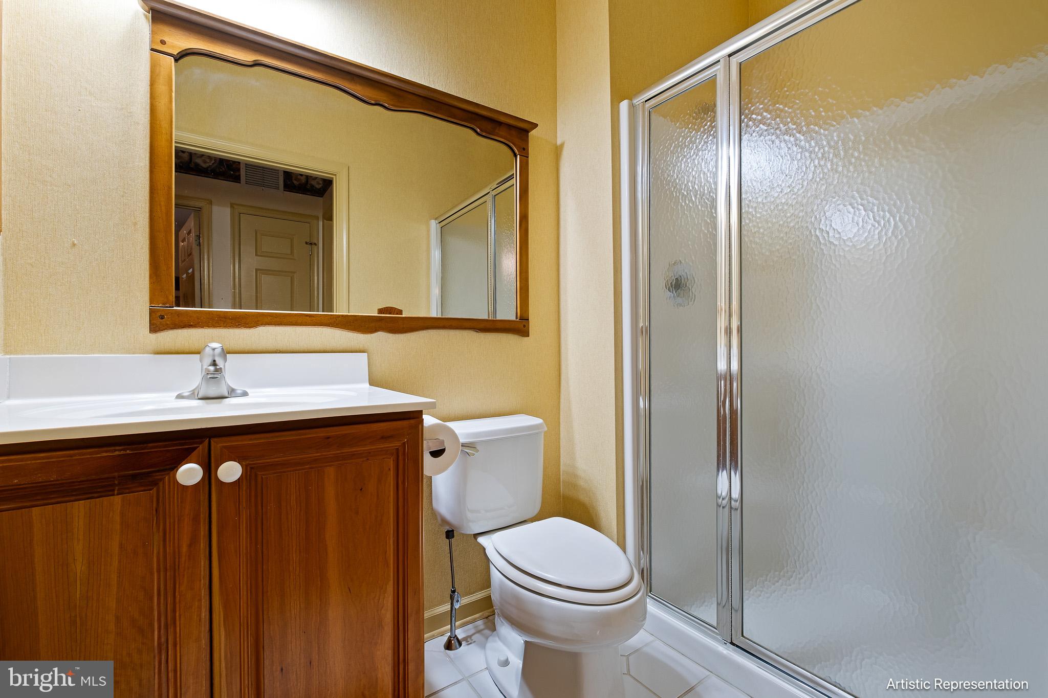 1515 Rockland Road, Unit 301 Wilmington, DE 19803 - Photo 21 of 49 a bathroom with a sink and a mirror