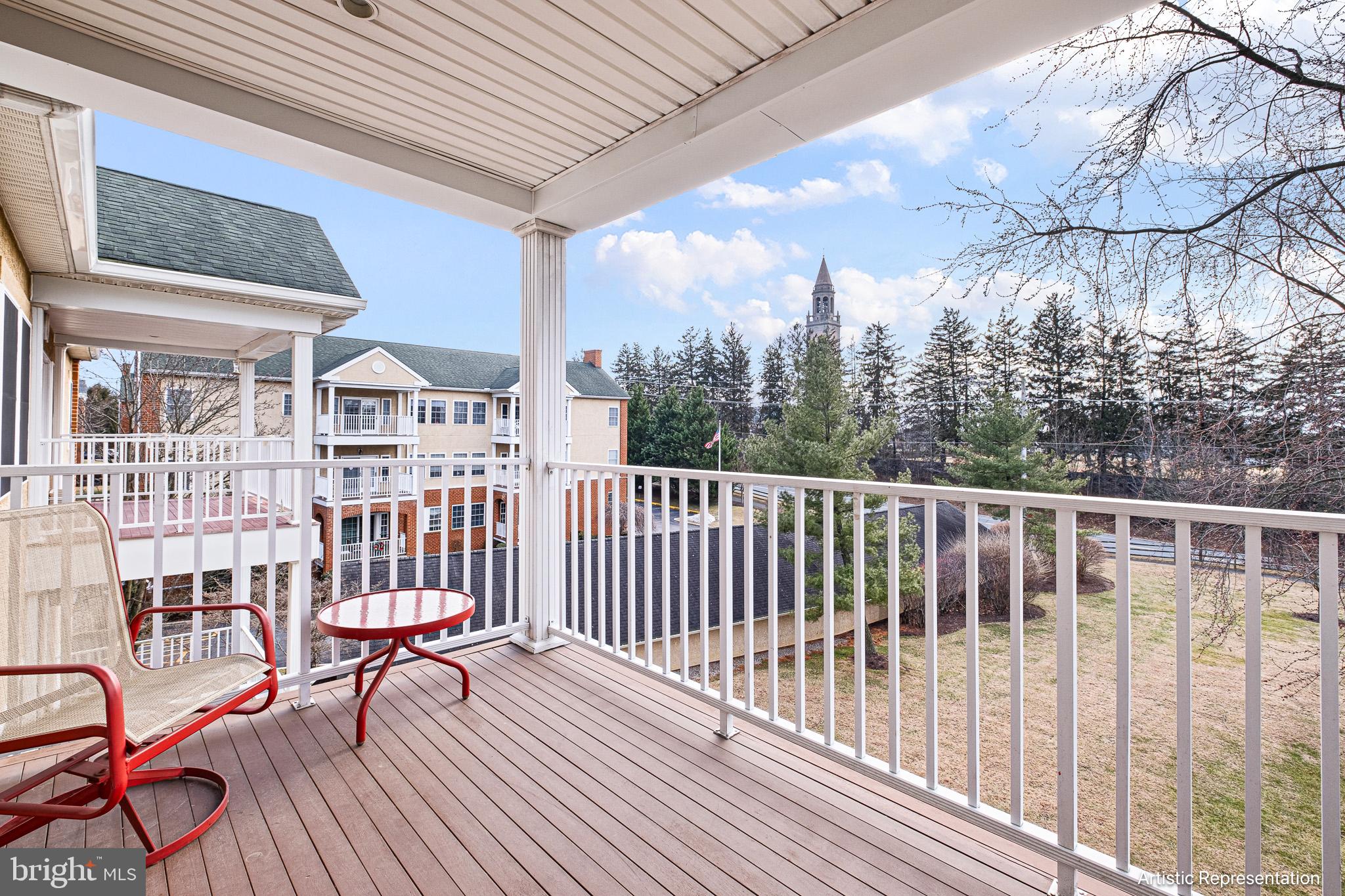 1515 Rockland Road, Unit 301 Wilmington, DE 19803 - Photo 22 of 49 a view of a chairs on wooden deck