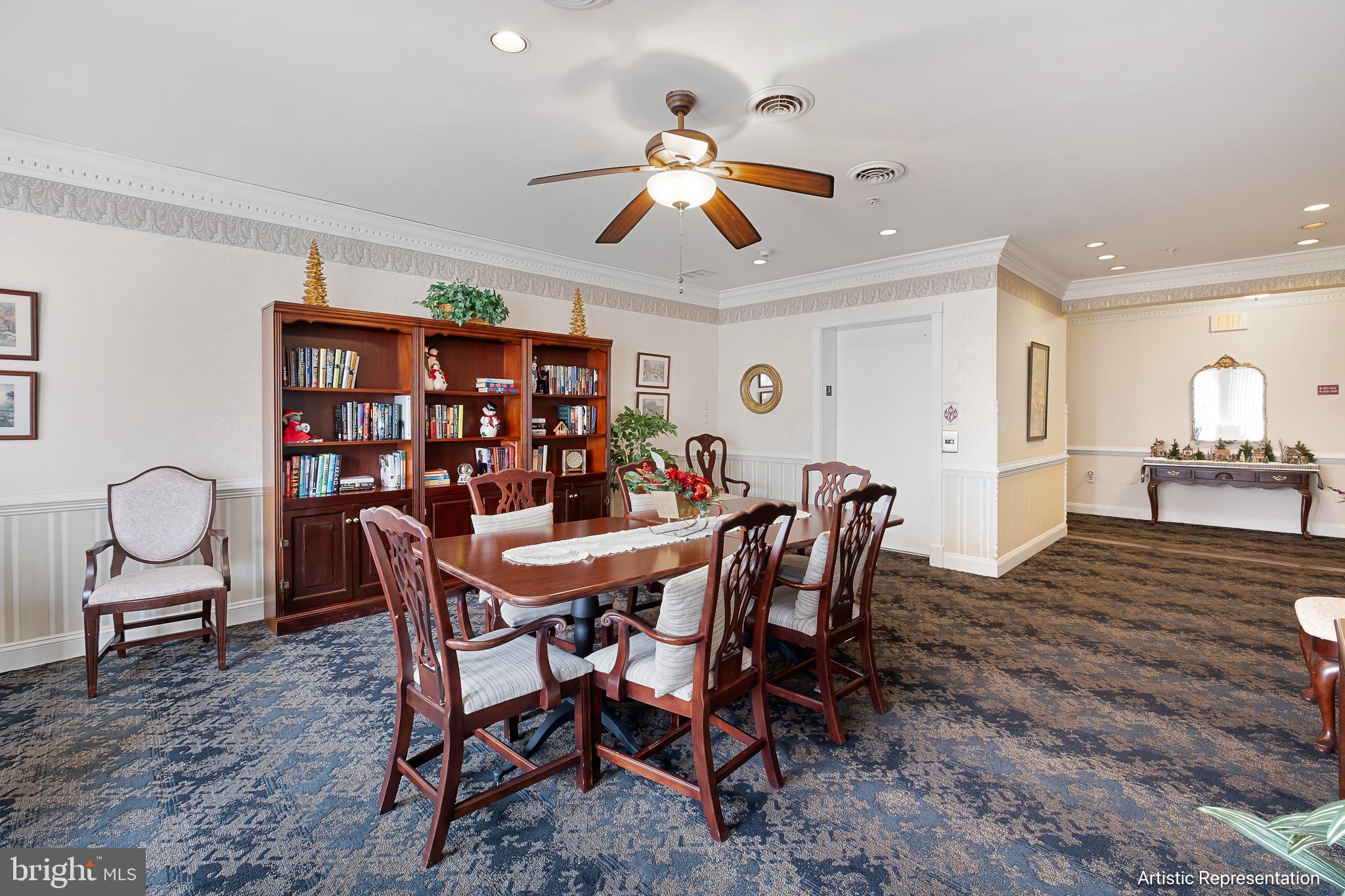 1515 Rockland Road, Unit 301 Wilmington, DE 19803 - Photo 25 of 49 a view of a dining room with furniture and wooden floor