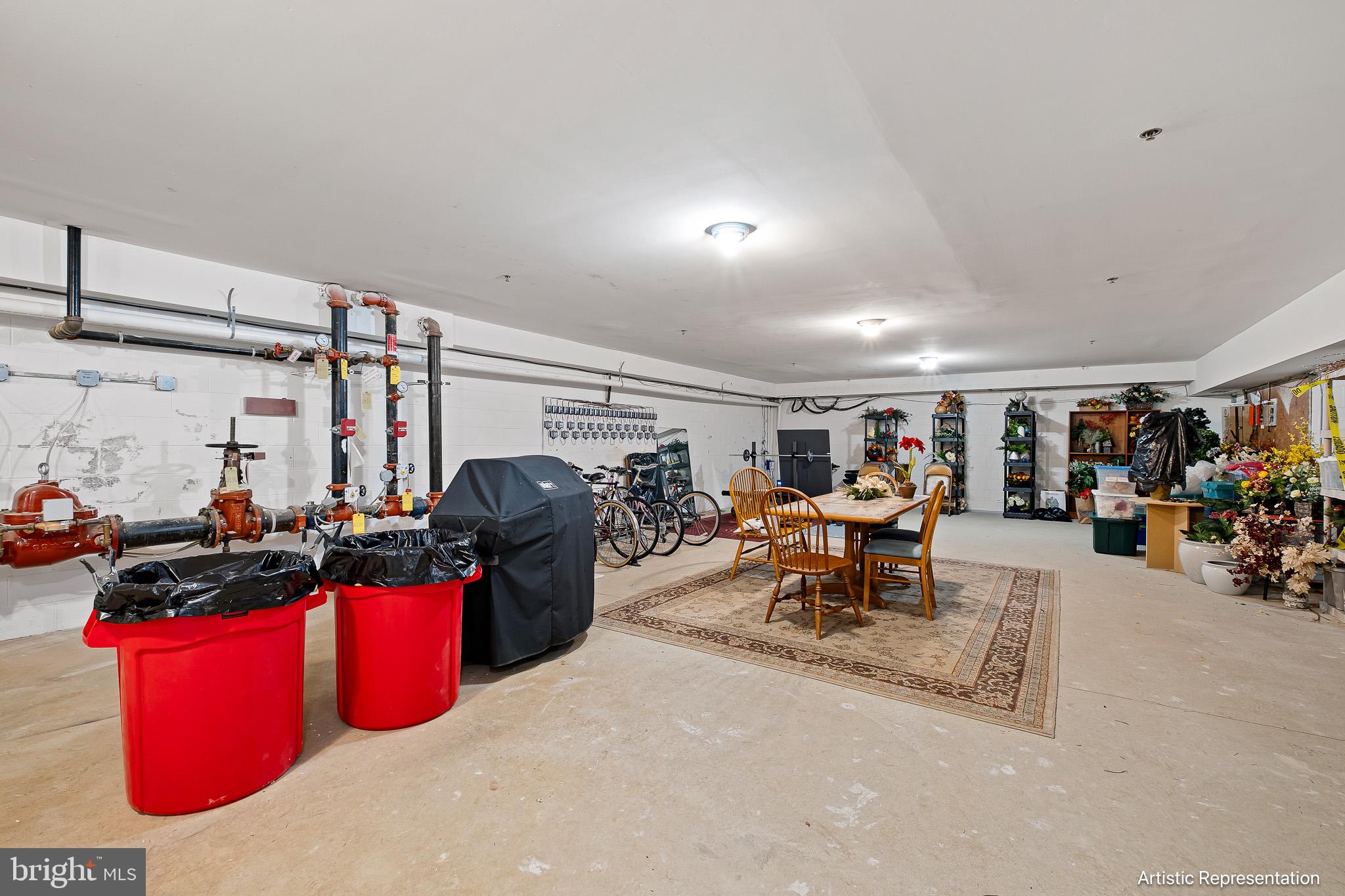 1515 Rockland Road, Unit 301 Wilmington, DE 19803 - Photo 31 of 49 a living room with lots of furniture and gym equipment