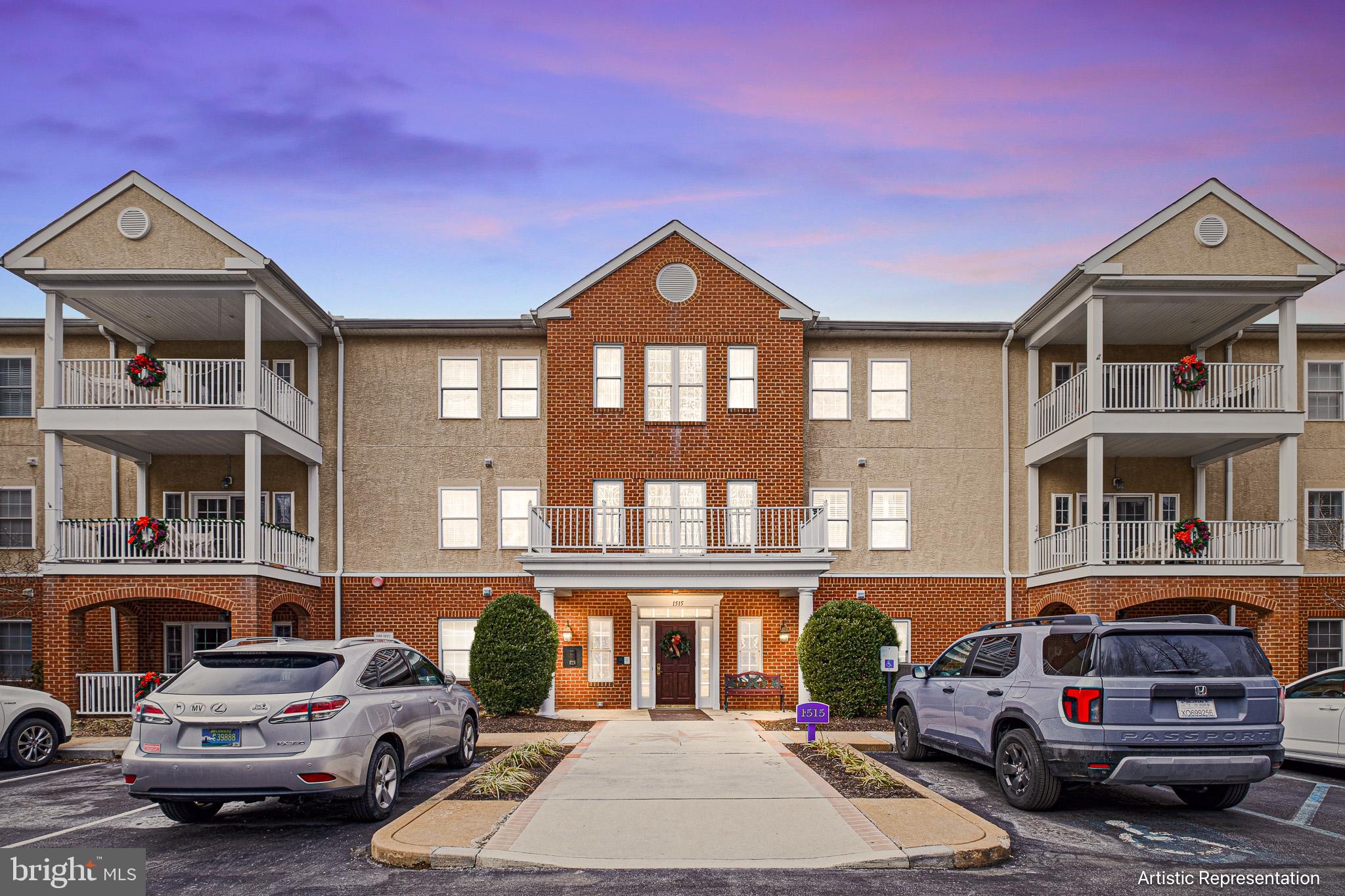 1515 Rockland Road, Unit 301 Wilmington, DE 19803 - Photo 49 of 49 a front view of a house with a yard