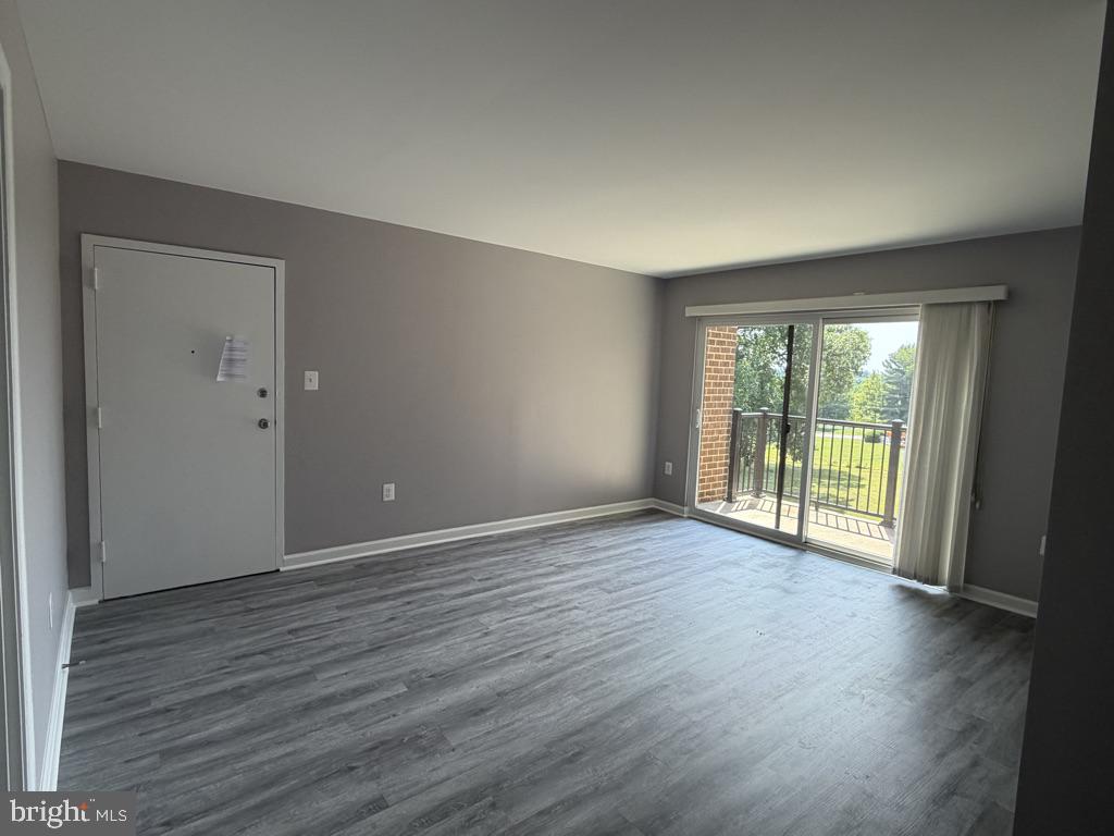 3216 Spartan Road, Unit 40 Olney, MD 20832 - Photo 27 of 35 Living Room w/Balcony