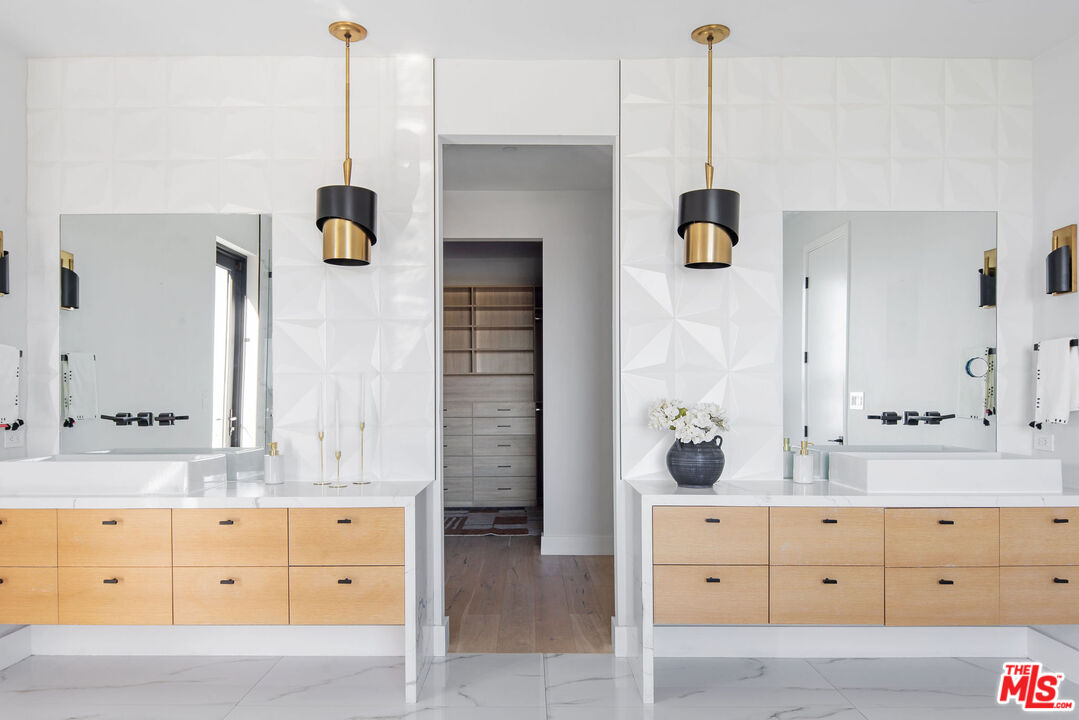 2181 Beech Knoll Road Los Angeles, CA 90046 - Photo 18 of 30 a spacious bathroom with a granite countertop sink mirror and double