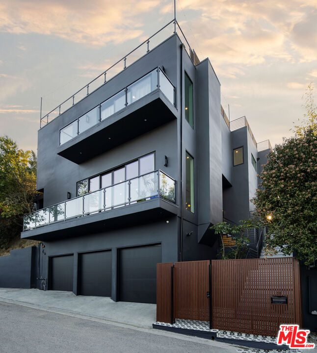 2181 Beech Knoll Road Los Angeles, CA 90046 - Photo 2 of 30 a view of a house with a garage