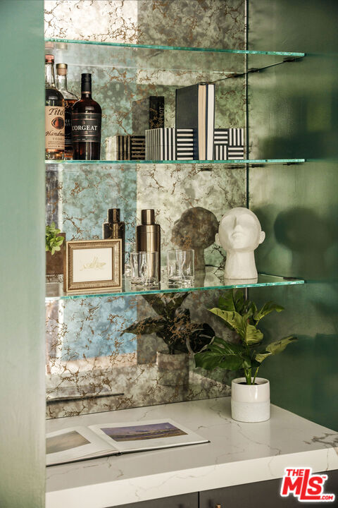 2181 Beech Knoll Road Los Angeles, CA 90046 - Photo 10 of 30 a vase of flowers sitting on a table