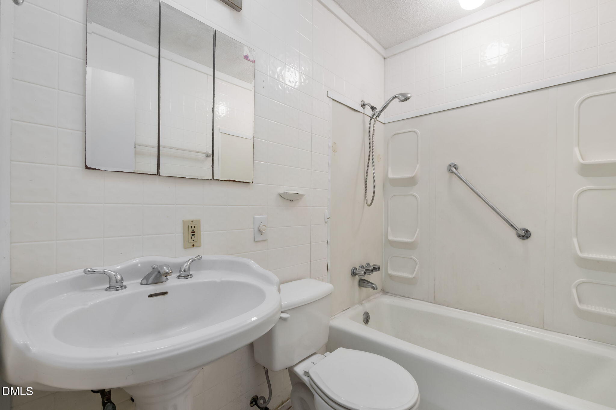 95 Harold Gill Road Roxboro, NC 27574 - Photo 16 of 53 a bathroom with a sink toilet and bathtub