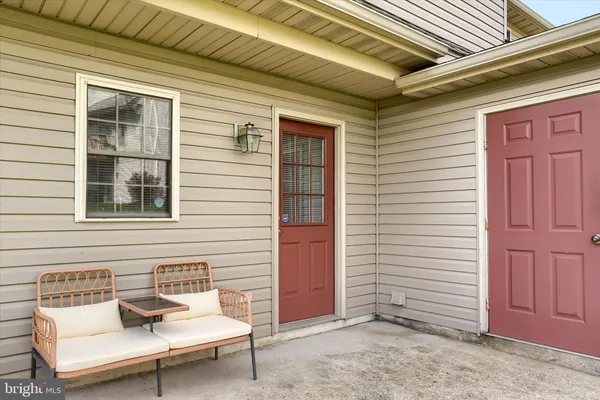 a building outdoor space with patio furniture