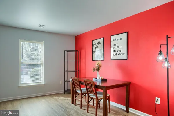 a view of a livingroom with furniture and window