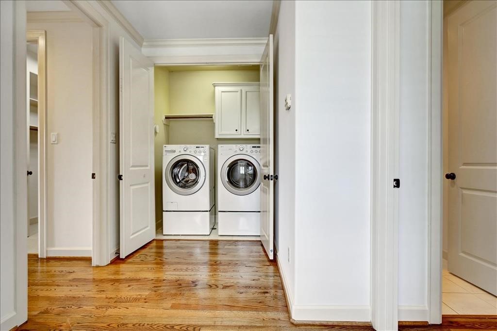 2318 Welch Street Houston, TX 77019 - Photo 20 of 35 Top-of-the-line front load washer & dryer in third floor utility room