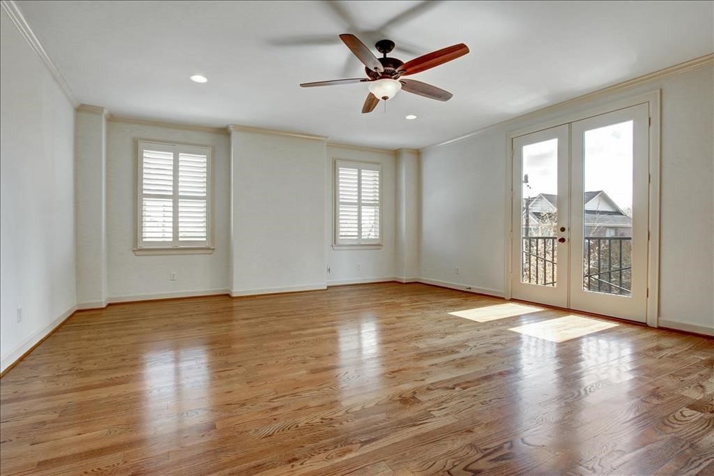 2318 Welch Street Houston, TX 77019 - Photo 22 of 35 Plantation shutters, recess lighting & French doors to balcony