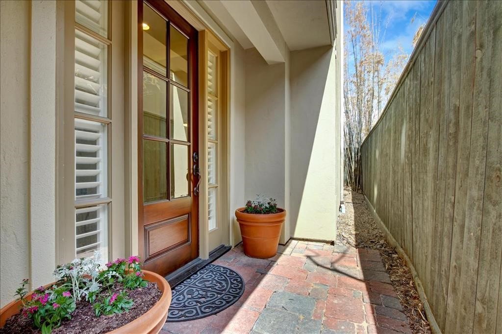 2318 Welch Street Houston, TX 77019 - Photo 3 of 35 Covered front porch entryway with mahogany front door