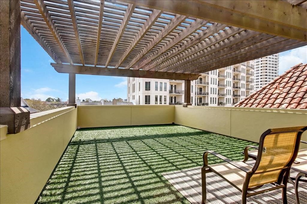 2318 Welch Street Houston, TX 77019 - Photo 31 of 35 Custom roof-top with cedar-wood Arbour shade, ideal for outdoor living areas on fouth floor