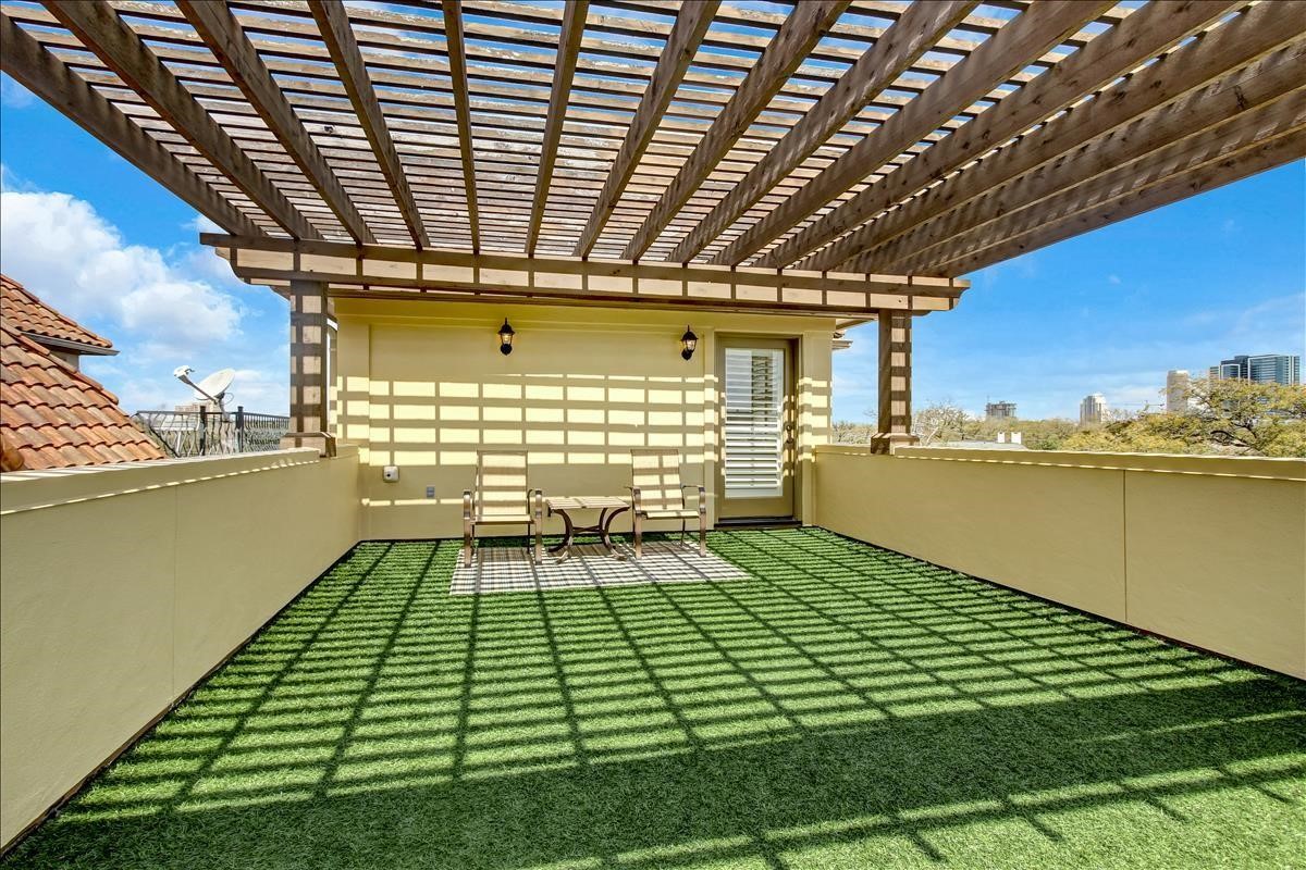 2318 Welch Street Houston, TX 77019 - Photo 33 of 35 Roof top from another angle with French door, custom light fixtures, electric outlets, water & gas fixture for BBQ