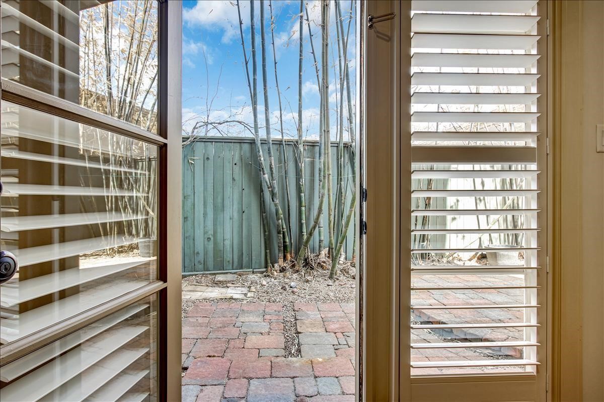 2318 Welch Street Houston, TX 77019 - Photo 8 of 35 Convenient access to private backyard & Pavestone patio refurbished in 2021