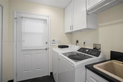 a view of kitchen and sink