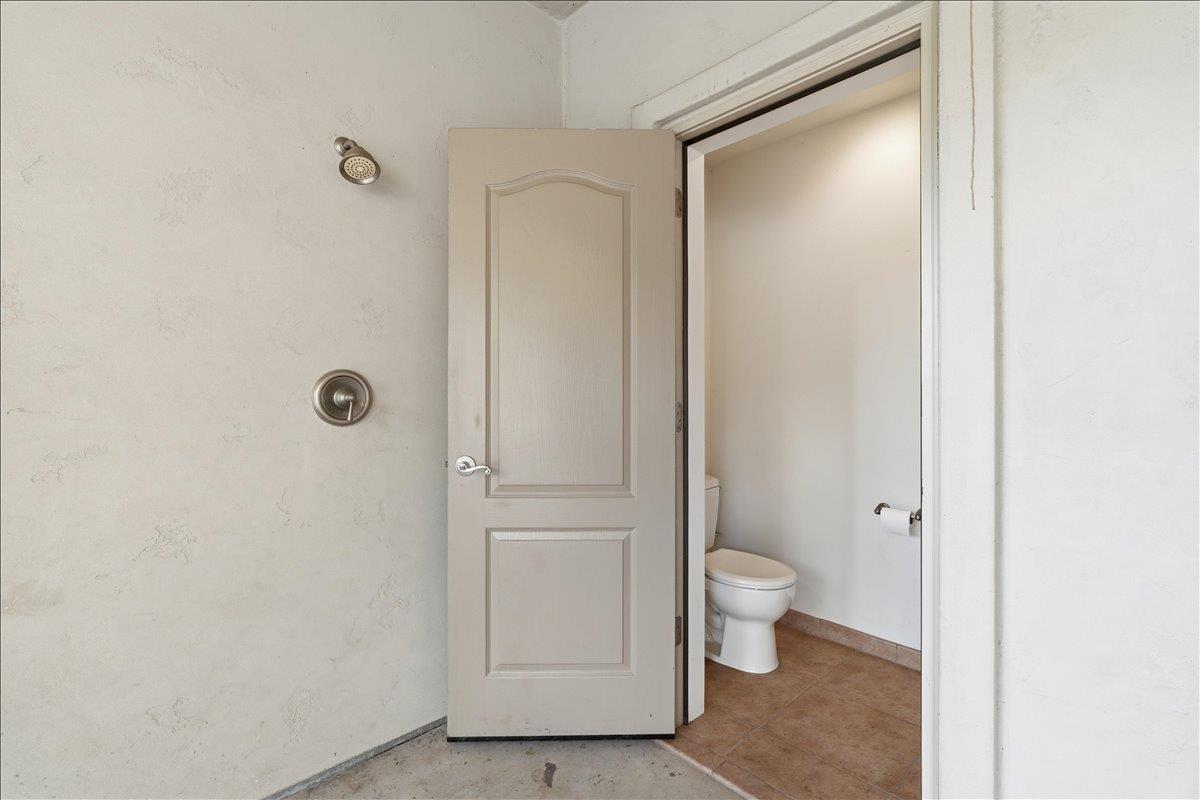 5525 Green Valley Road Placerville, CA 95667 - Photo 9 of 53 Half bath with outdoor shower next to covered patio near the pool - Never walk through the house with wet feet again