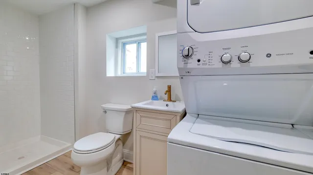 a bathroom with a toilet and a sink