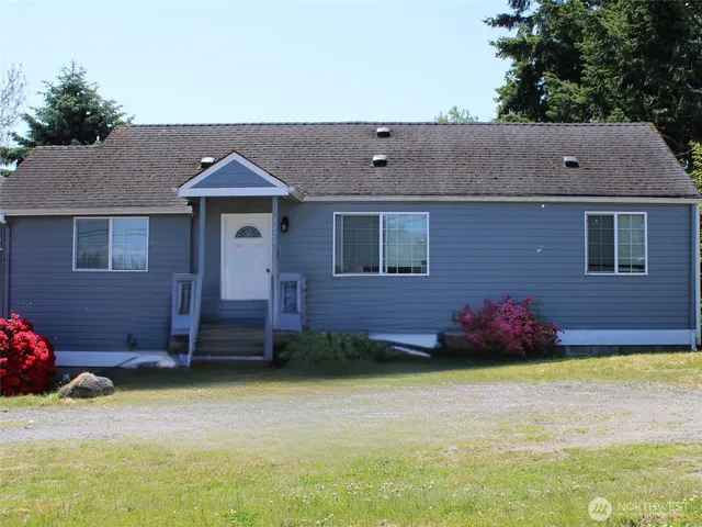 a view of a backyard of house
