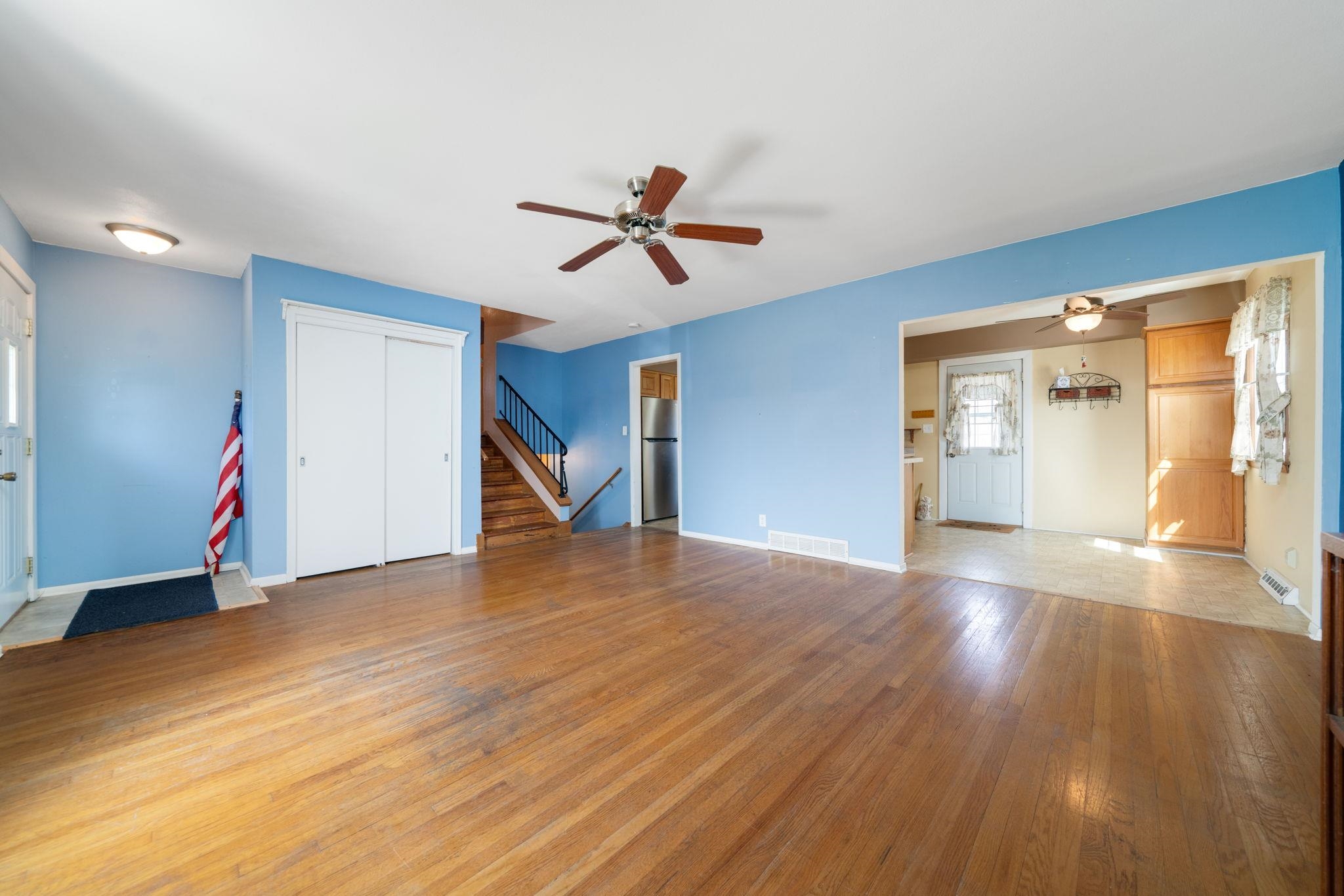1611 Notre Dame Road Rockford, IL 61103 - Photo 4 of 33 a view of empty room with wooden floor and fan