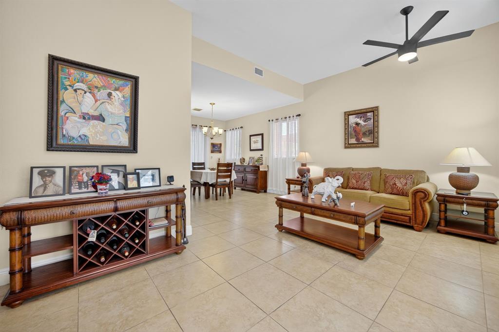 18203 Southwest 152nd Place Miami, FL 33187 - Photo 12 of 55 a living room with furniture