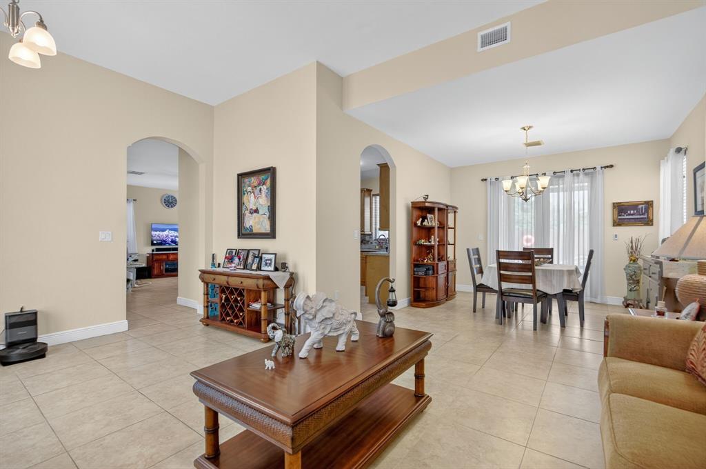 18203 Southwest 152nd Place Miami, FL 33187 - Photo 13 of 55 a living room with furniture and wooden floor