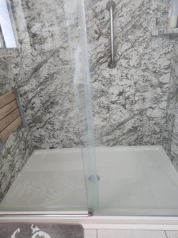 18203 Southwest 152nd Place Miami, FL 33187 - Photo 32 of 55 a bathroom with a bathtub