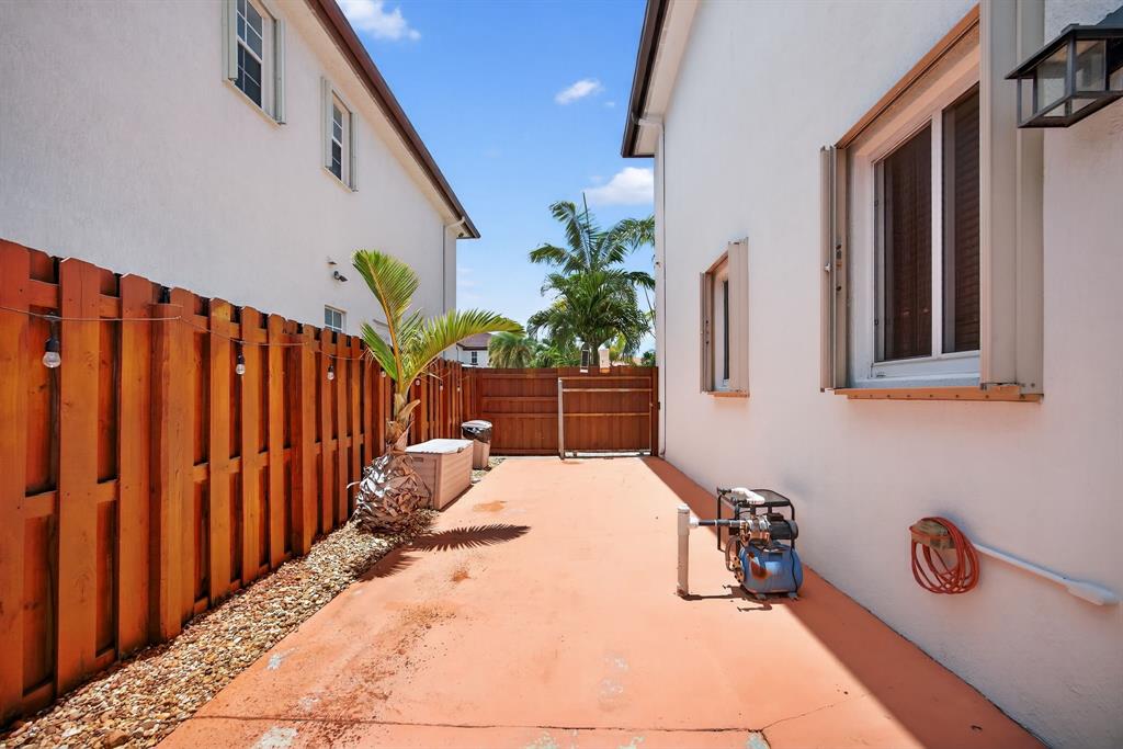 18203 Southwest 152nd Place Miami, FL 33187 - Photo 49 of 55 a view of a backyard of the house