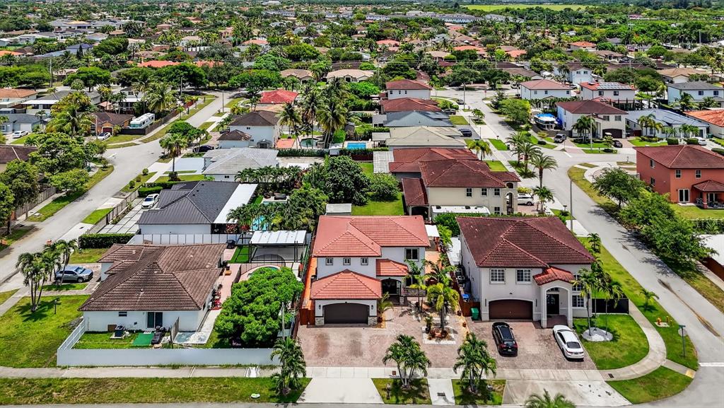 18203 Southwest 152nd Place Miami, FL 33187 - Photo 6 of 55 an aerial view of residential houses with outdoor space