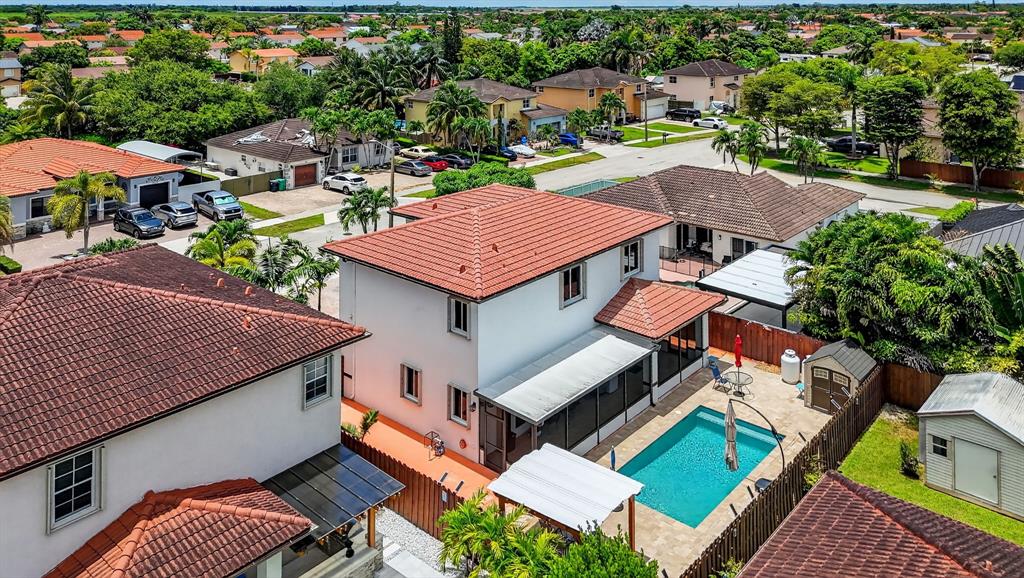 18203 Southwest 152nd Place Miami, FL 33187 - Photo 9 of 55 an aerial view of a house with a yard