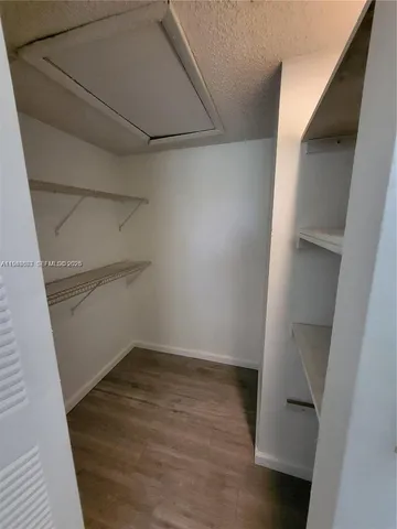a view of an empty walk in closet