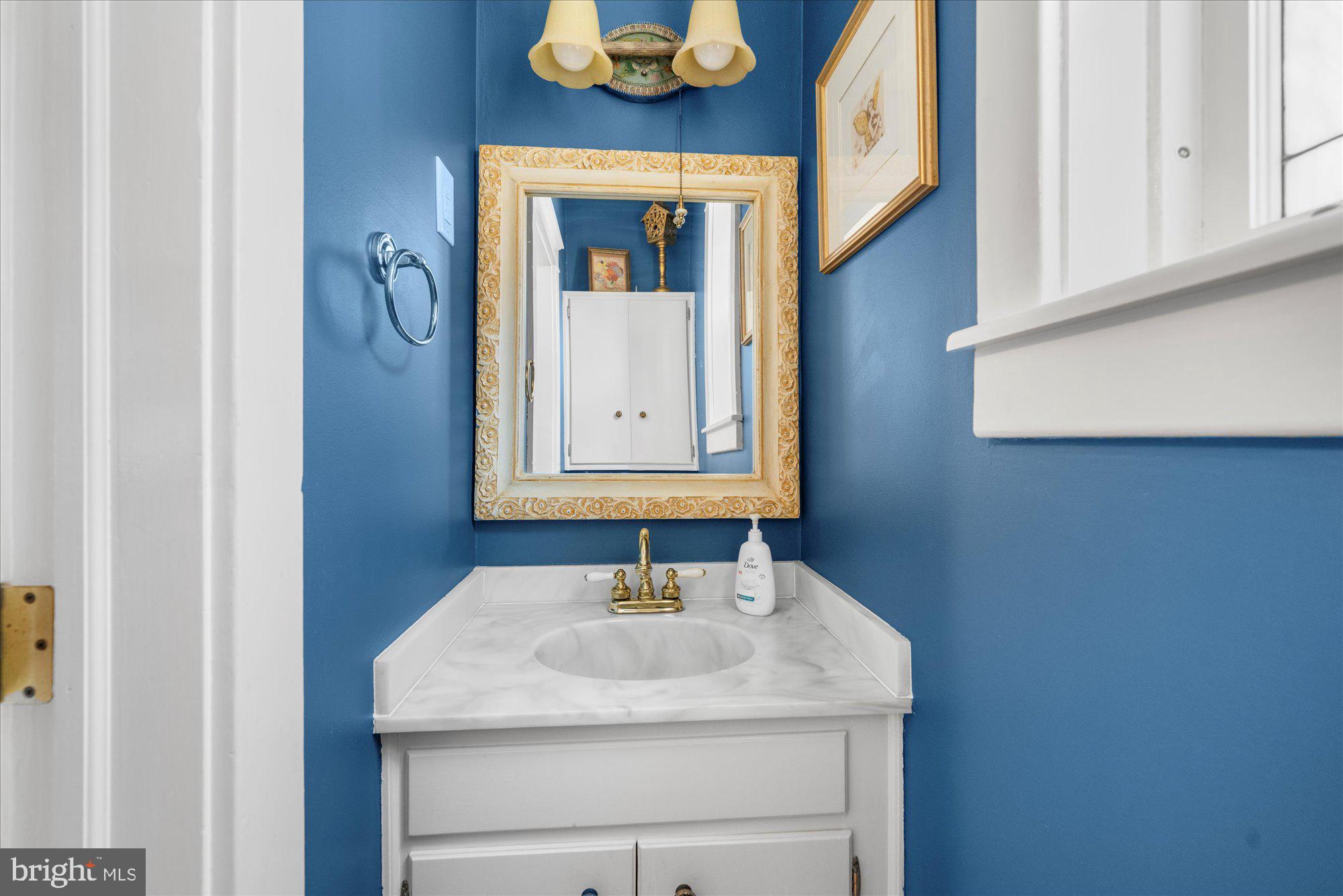 3 Reading Avenue Reading, PA 19607 - Photo 15 of 44 a bathroom with a sink and a mirror