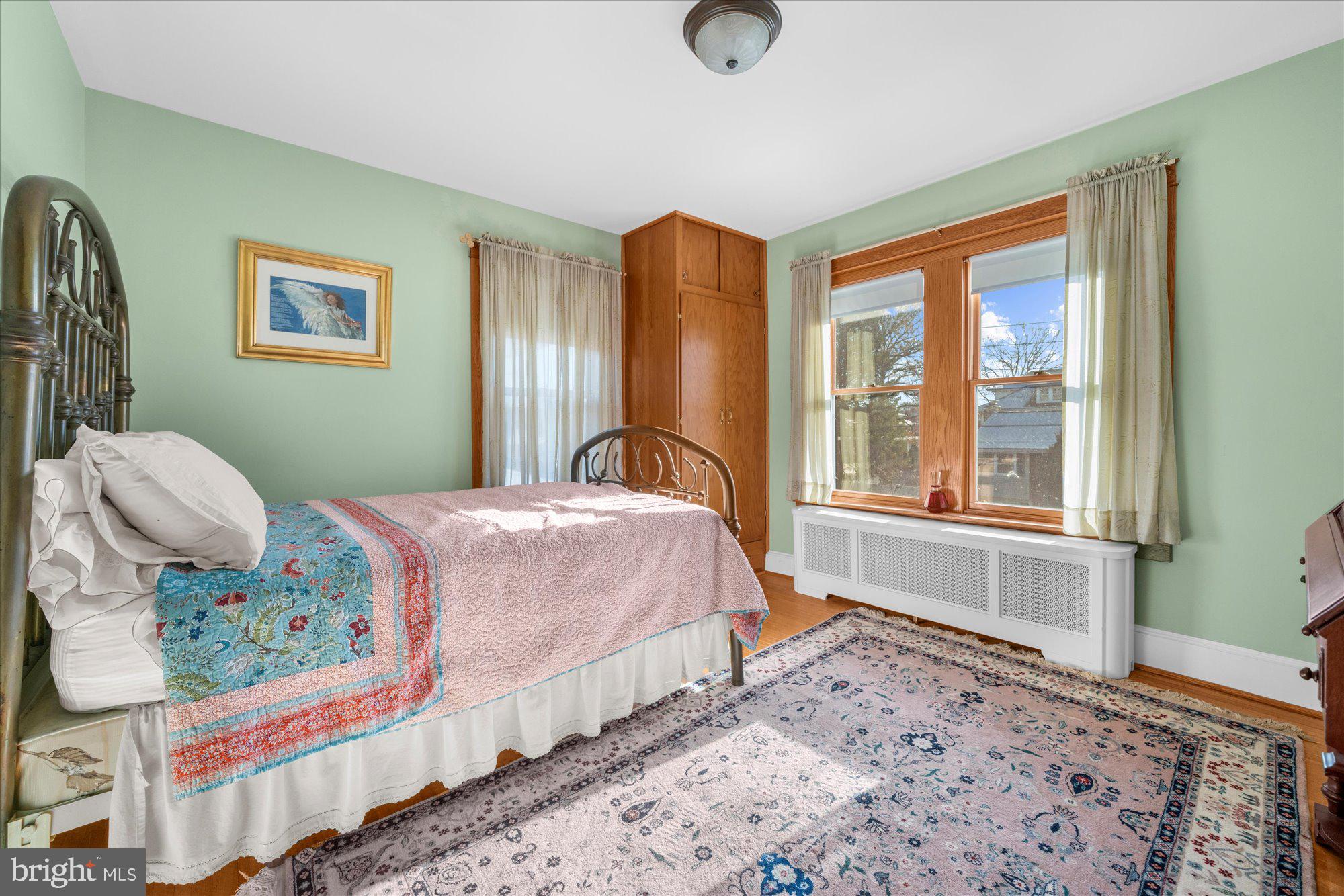3 Reading Avenue Reading, PA 19607 - Photo 18 of 44 a bedroom with a bed and wooden floor