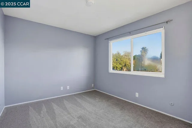 an empty room with window