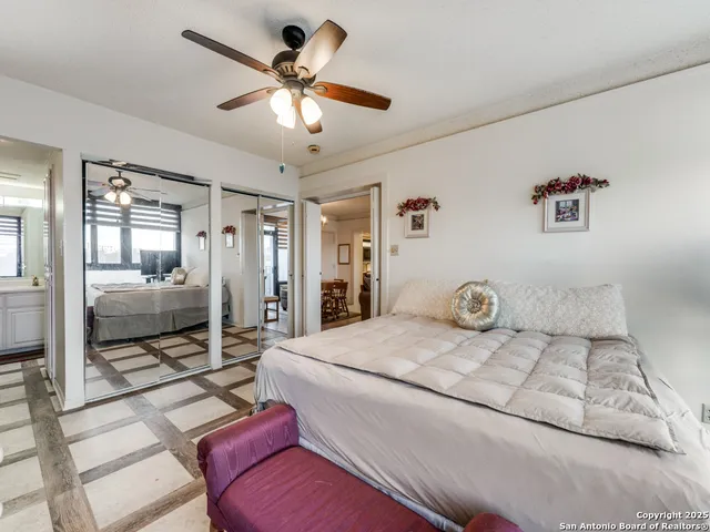 a living room with couch and a flat screen tv