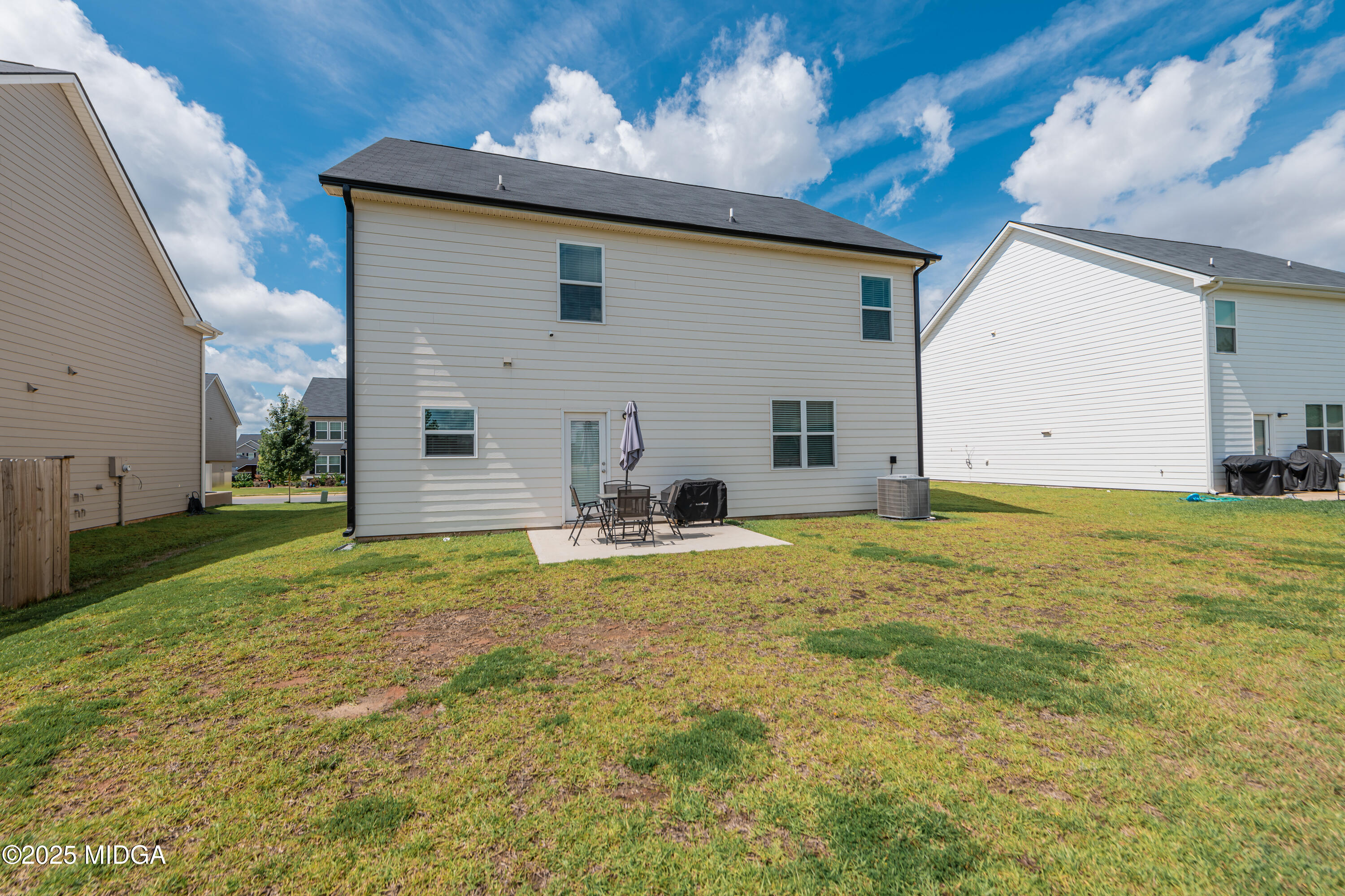 126 Farmers Way Perry, GA 31069 - Photo 30 of 33 a view of a house with backyard and garden