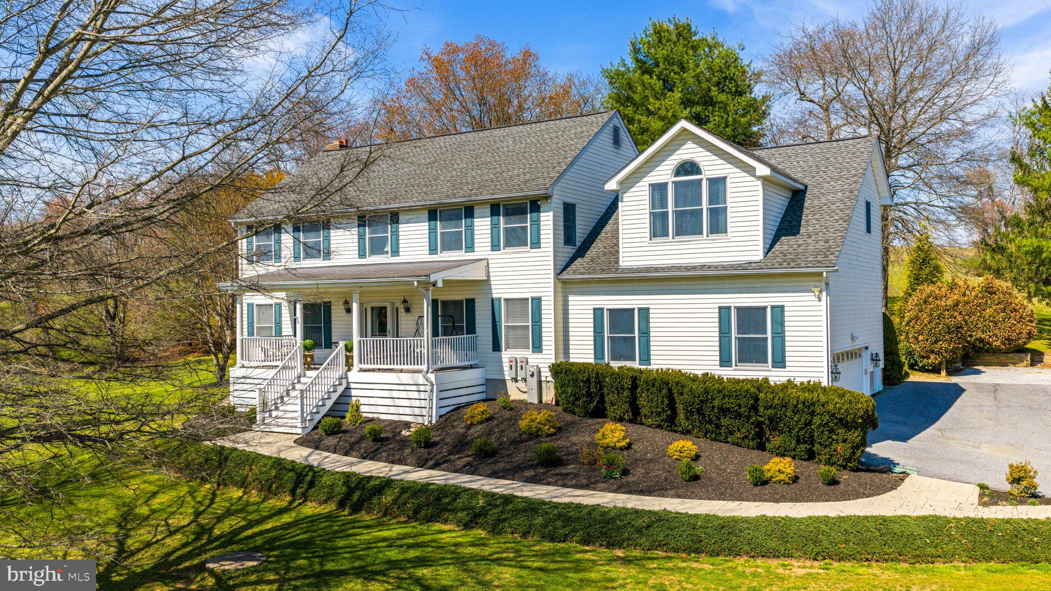 21310 West Liberty Road Parkton, MD 21120 - Photo 102 of 111 a front view of a house with a yard