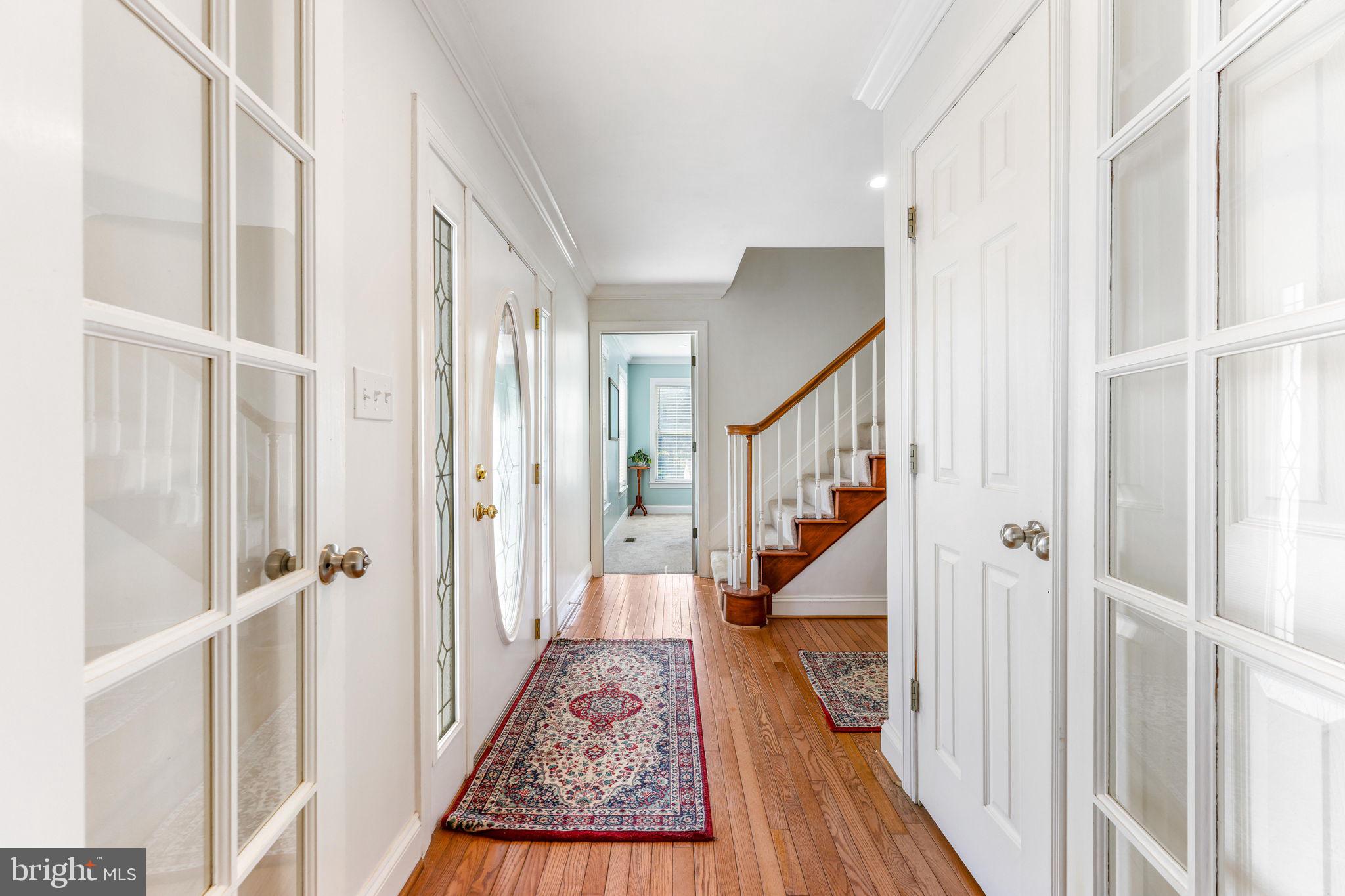 21310 West Liberty Road Parkton, MD 21120 - Photo 13 of 111 a view of a hallway with wooden floor and staircase