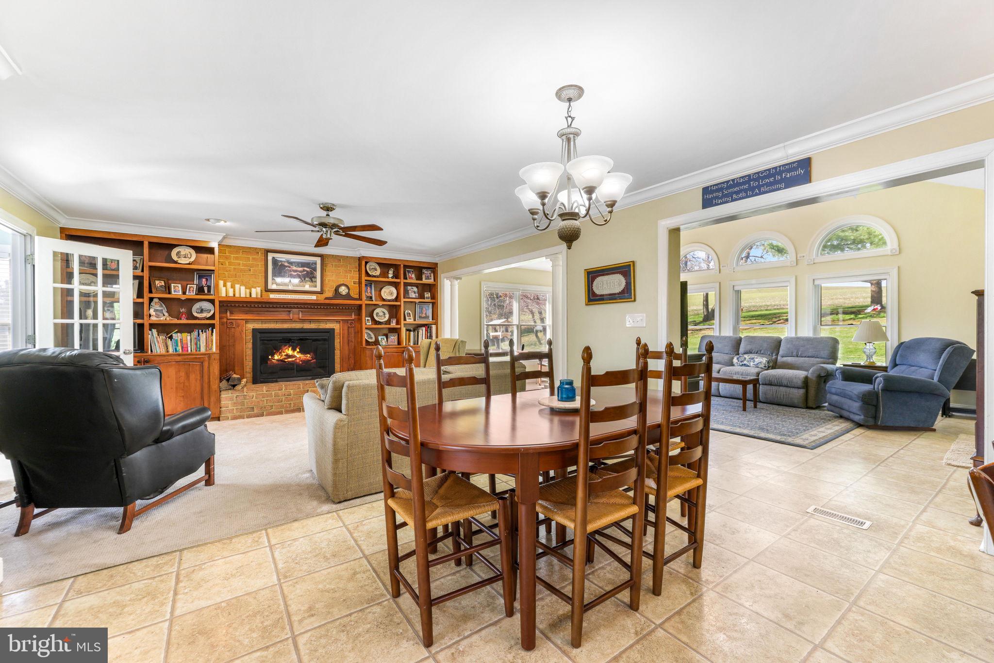 21310 West Liberty Road Parkton, MD 21120 - Photo 27 of 111 a view of a dining room with furniture and a chandelier