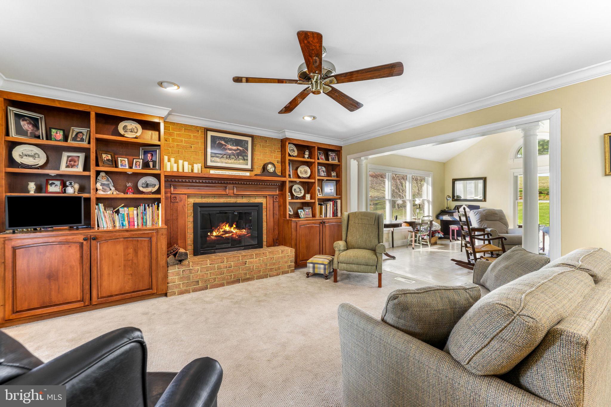 21310 West Liberty Road Parkton, MD 21120 - Photo 28 of 111 a living room with furniture and a fireplace