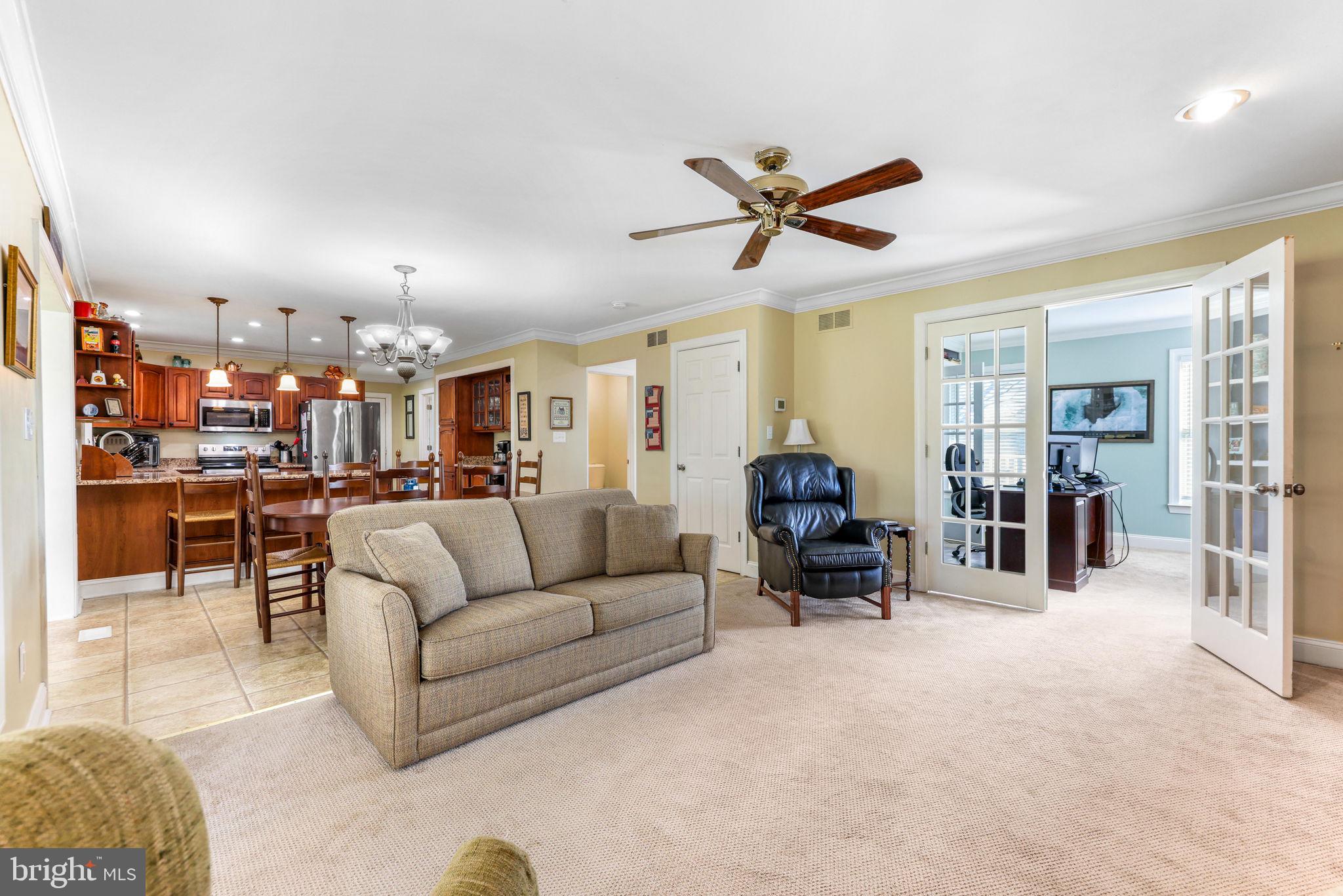 21310 West Liberty Road Parkton, MD 21120 - Photo 31 of 111 a living room with furniture and a view of kitchen